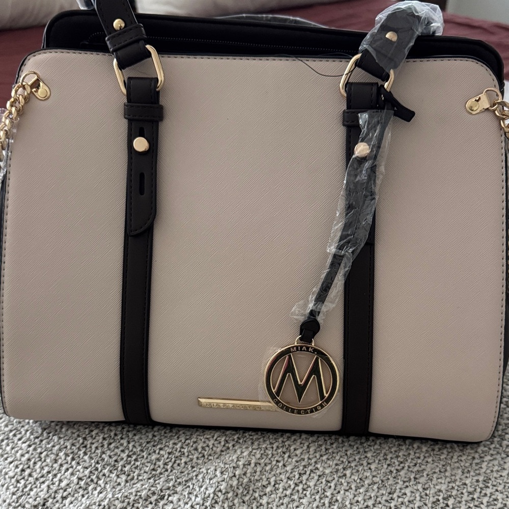 Elegant Cream and Black Satchel with Gold Details